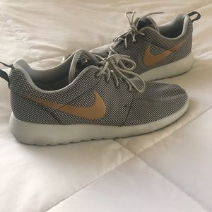 Grey and Gold Nike Roshes